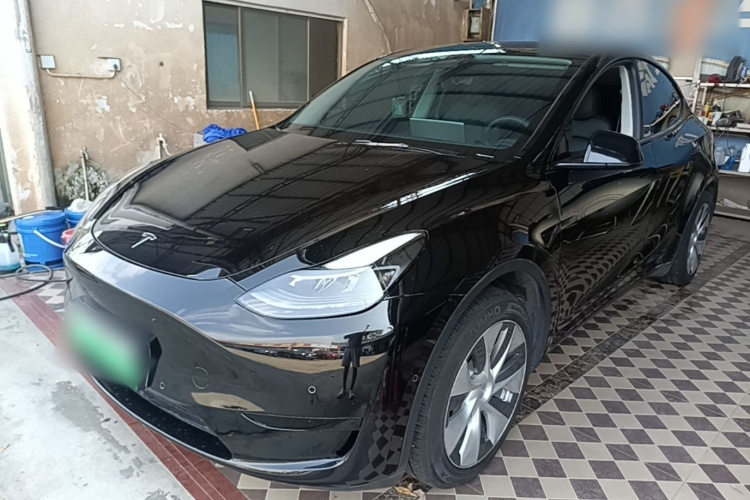 Tesla Model Y 2023 #2 Tesla Model Y 2023 car image #2