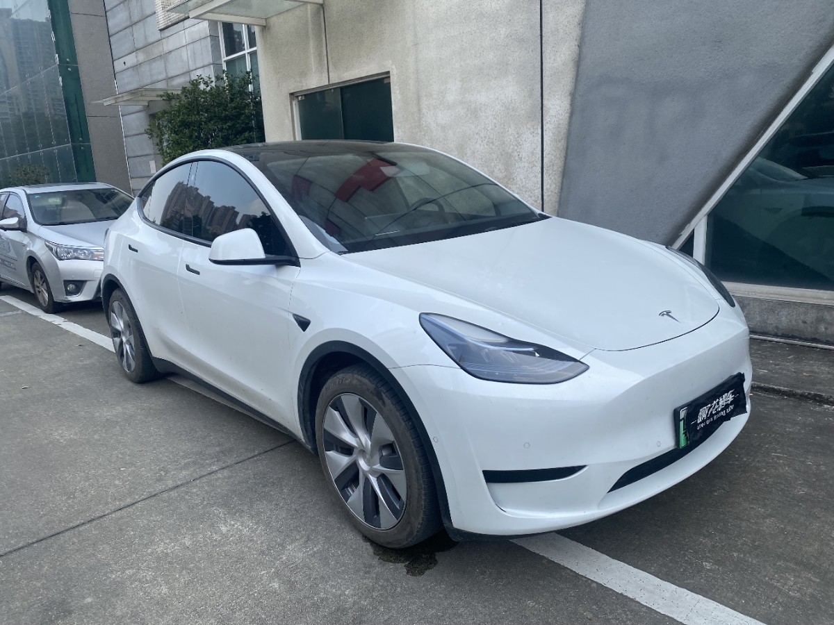 Tesla Model Y 2023 #3 Tesla Model Y 2023 car image #3