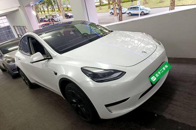 Tesla Model Y 2024 #4 Tesla Model Y 2024 car image #4