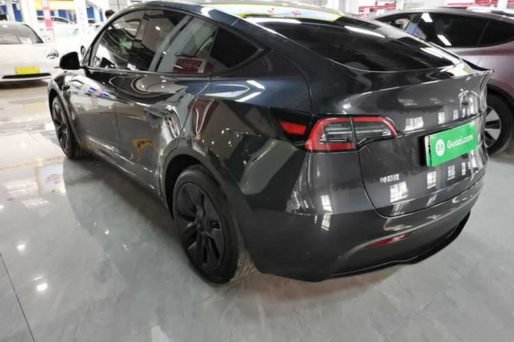 Tesla Model Y 2024 #5 Tesla Model Y 2024 car image #5