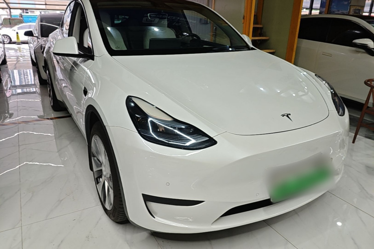 Tesla Model Y 2023 #4 Tesla Model Y 2023 car image #4
