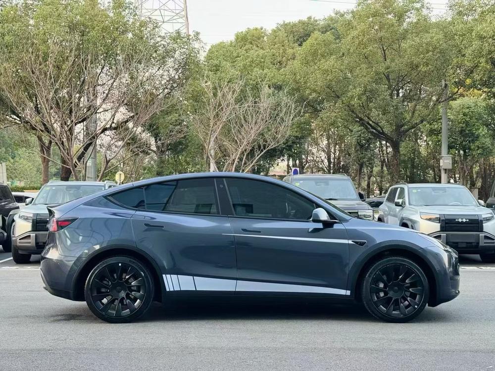 Tesla Model Y 2024 #6 Tesla Model Y 2024 car image #6