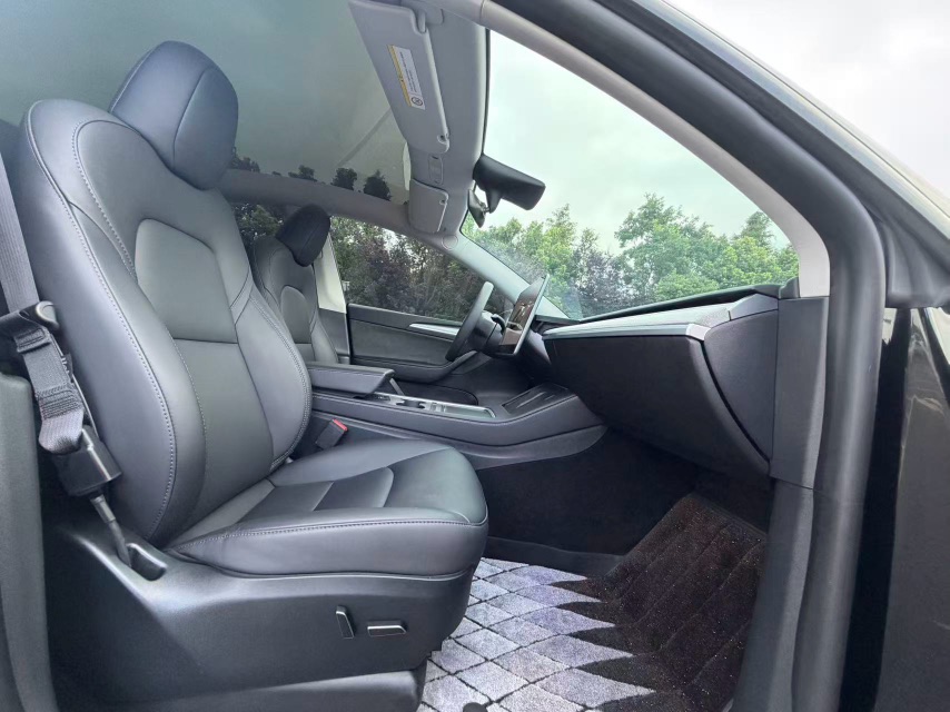 Tesla Model Y 2024 #6 Tesla Model Y 2024 car image #6