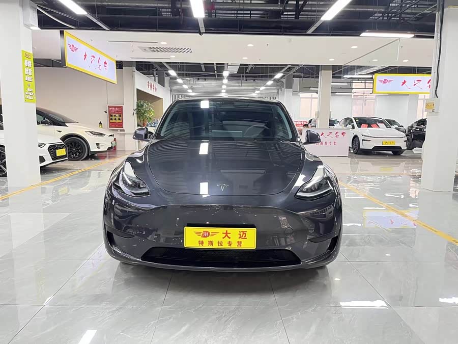 Tesla Model Y 2024 #4 Tesla Model Y 2024 car image #4