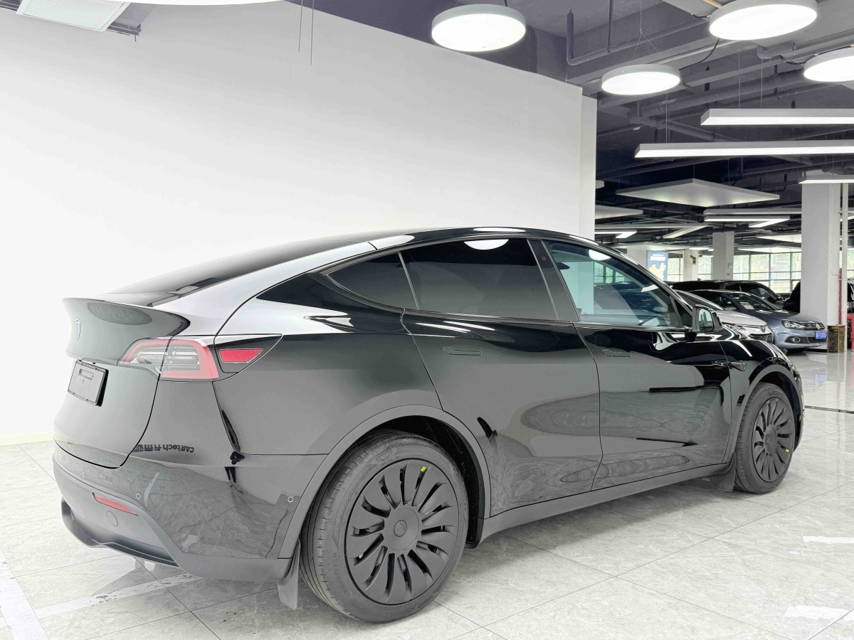 Tesla Model Y 2023 #4 Tesla Model Y 2023 car image #4
