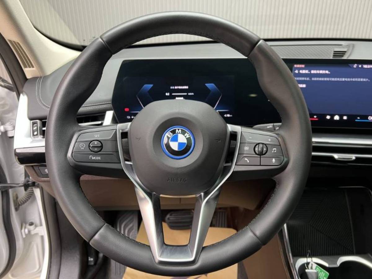 BMW iX1 2024 #4 BMW iX1 2024 immagine di auto #4