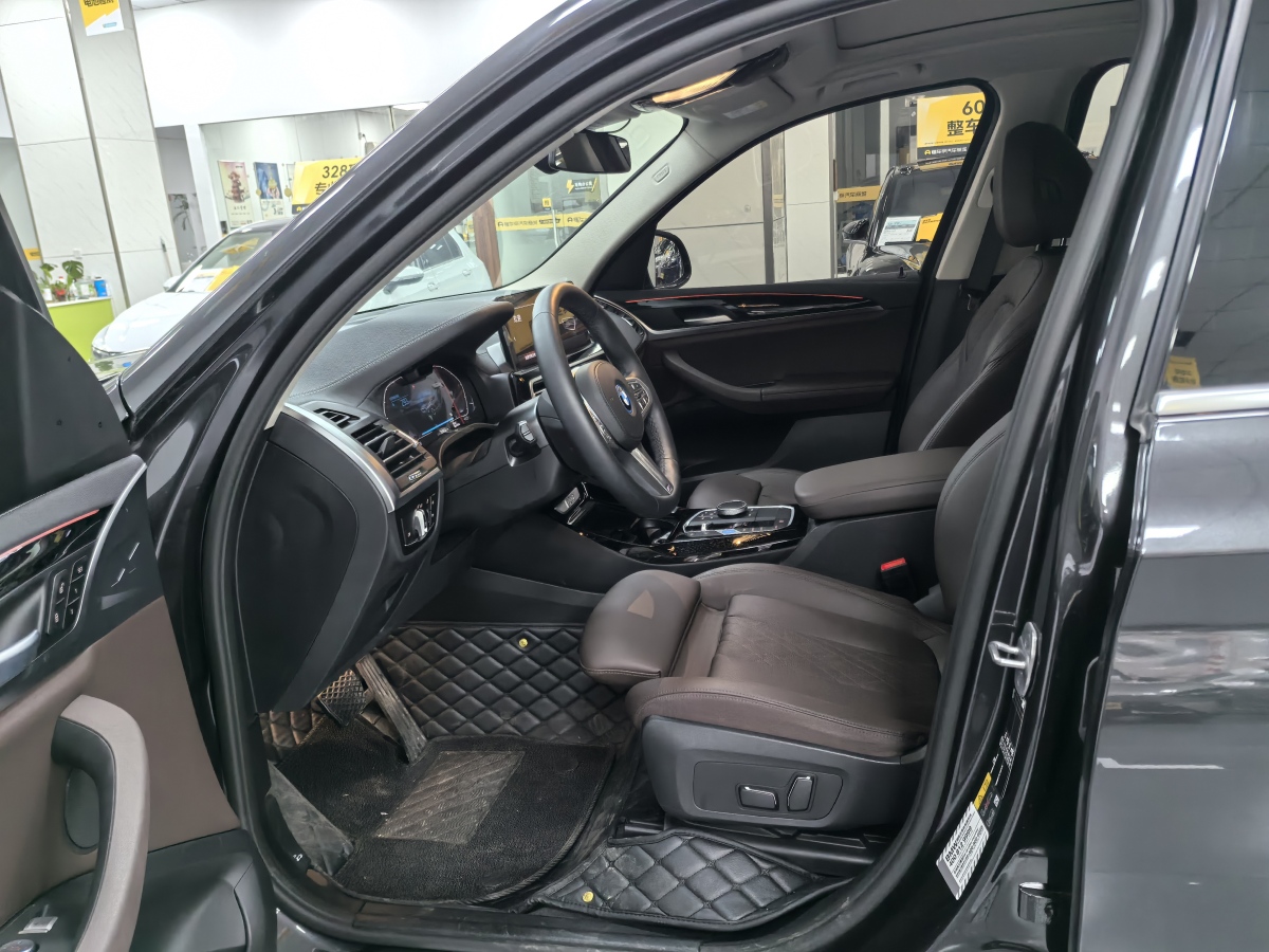 BMW iX3 2024 immagine di auto #4