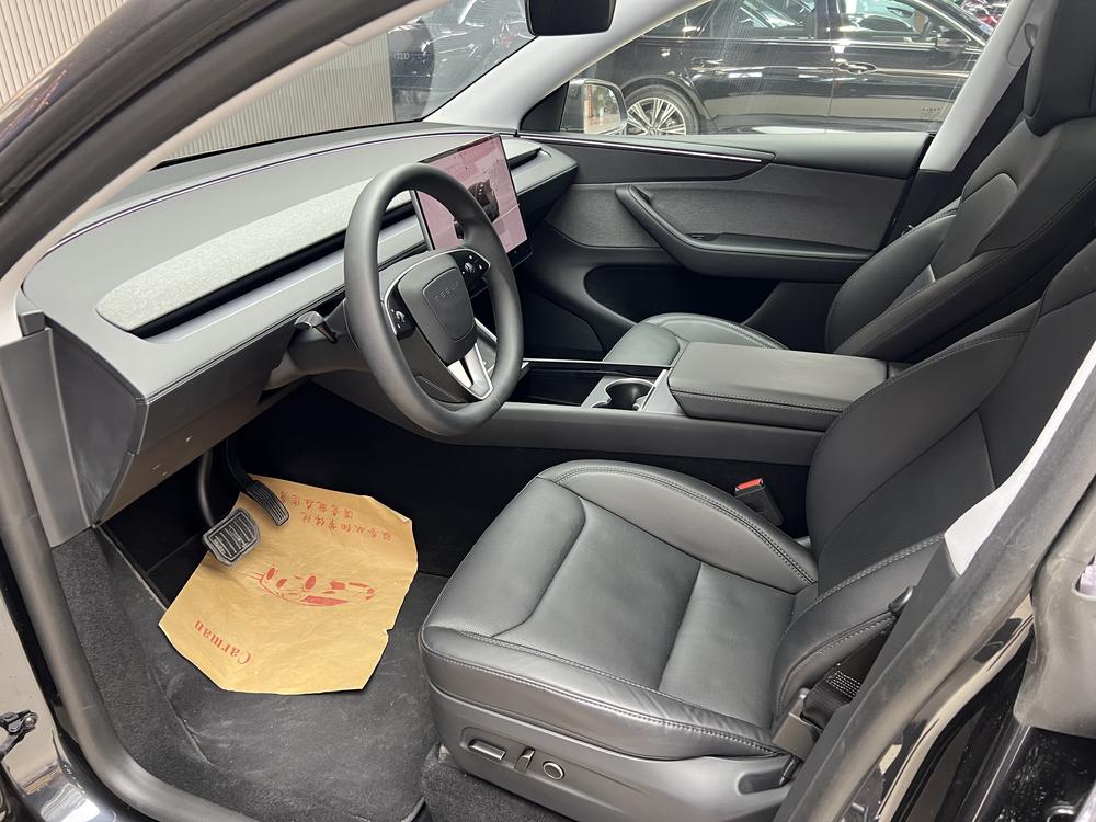 Tesla Model Y 2025 #12 Tesla Model Y 2025 car image #12
