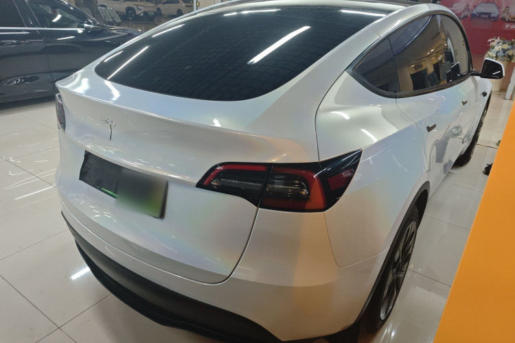 Tesla Model Y 2024 #5 Tesla Model Y 2024 car image #5