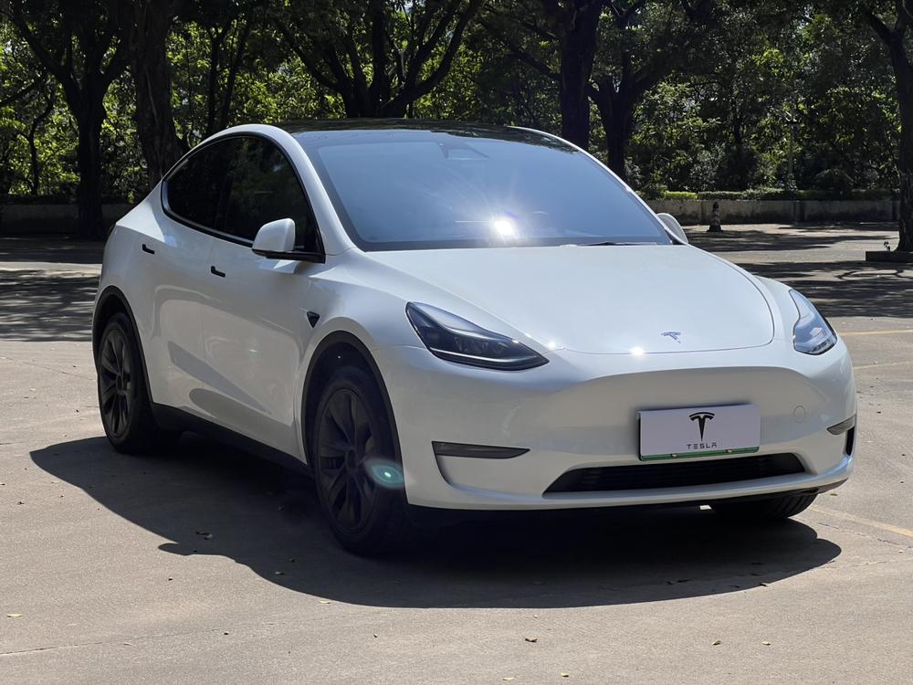 Tesla Model Y 2024 #3 Tesla Model Y 2024 car image #3