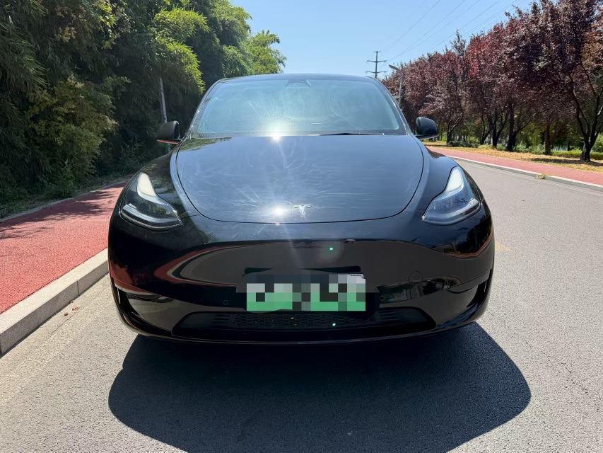 Tesla Model Y 2024 #3 Tesla Model Y 2024 car image #3