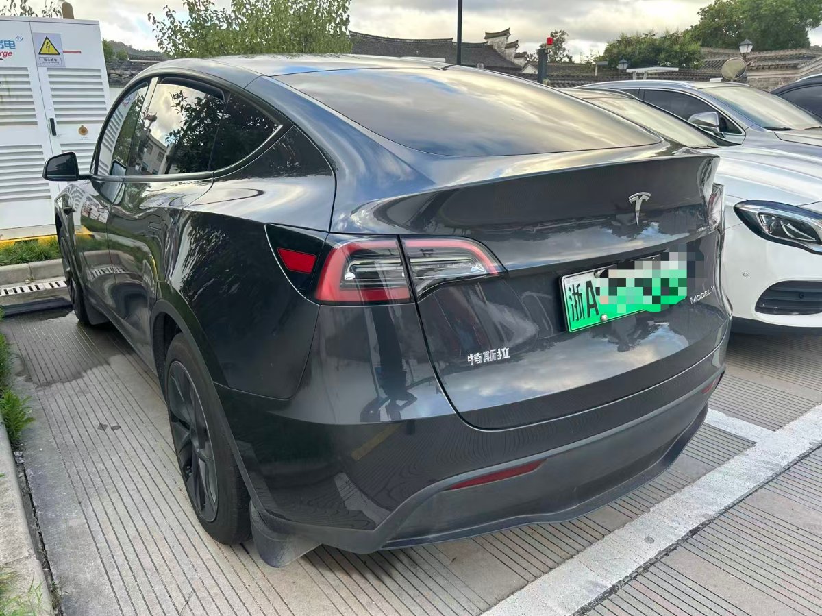 Tesla Model Y 2024 #5 Tesla Model Y 2024 car image #5