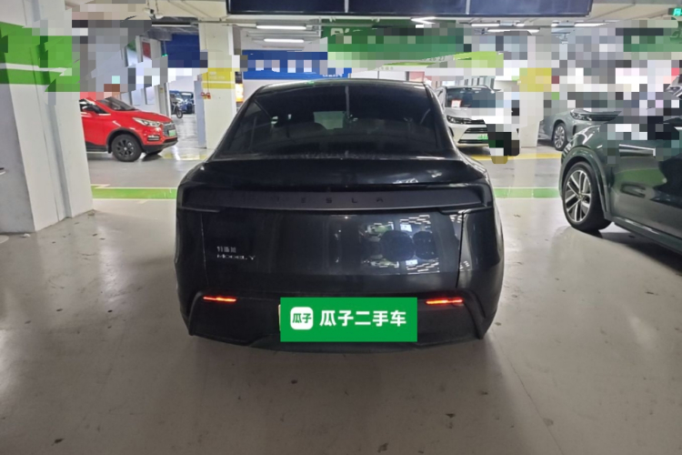 Tesla Model Y 2025 #4 Tesla Model Y 2025 car image #4
