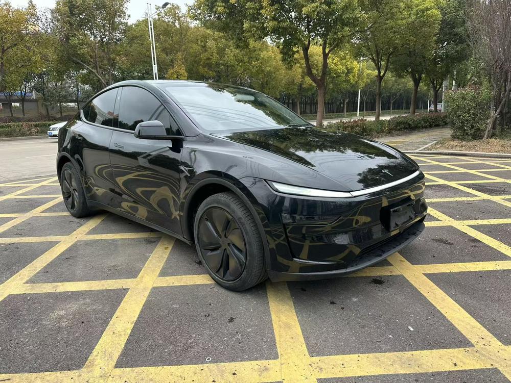 Tesla Model Y 2025 #3 Tesla Model Y 2025 car image #3
