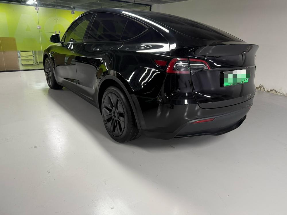 Tesla Model Y 2024 immagine di auto #4