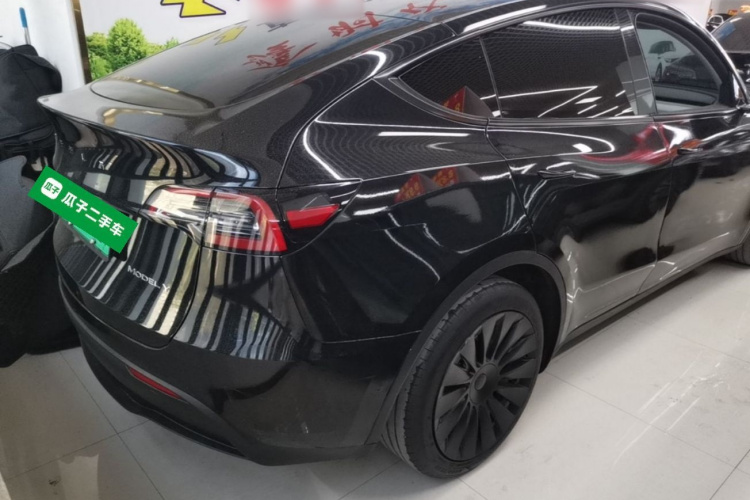Tesla Model Y 2024 #7 Tesla Model Y 2024 car image #7