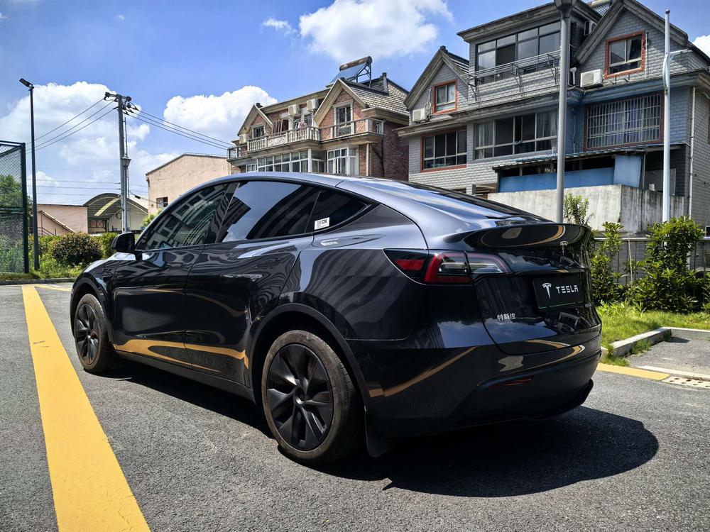 Tesla Model Y 2024 #5 Tesla Model Y 2024 car image #5