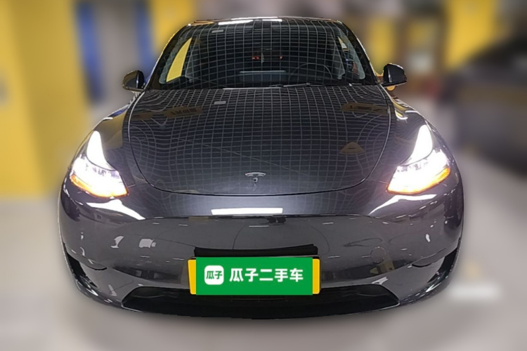 Tesla Model Y 2024 #3 Tesla Model Y 2024 car image #3