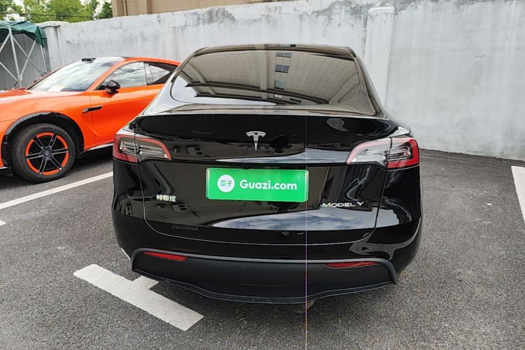 Tesla Model Y 2024 #6 Tesla Model Y 2024 car image #6