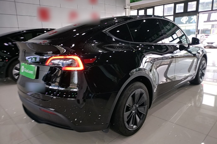 Tesla Model Y 2024 #7 Tesla Model Y 2024 car image #7