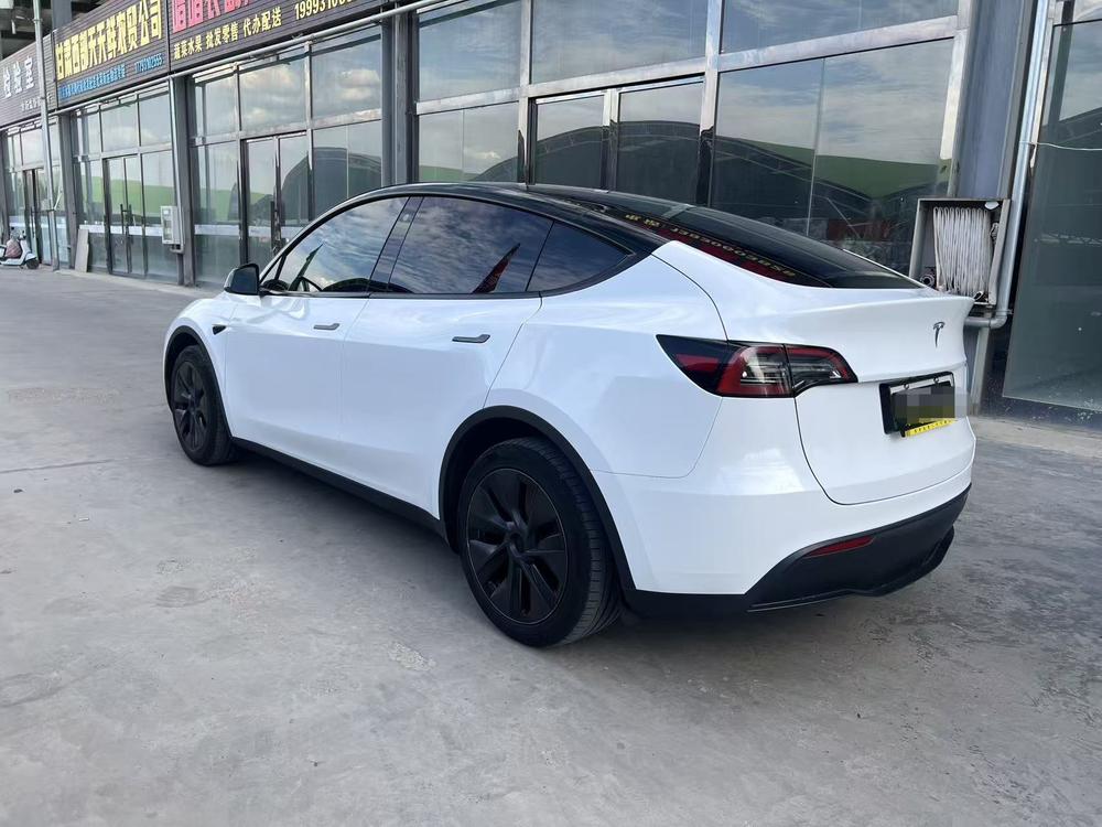 Tesla Model Y 2023 #4 Tesla Model Y 2023 car image #4