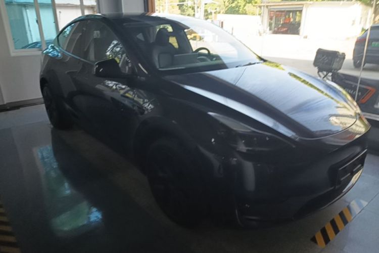 Tesla Model Y 2024 #4 Tesla Model Y 2024 car image #4