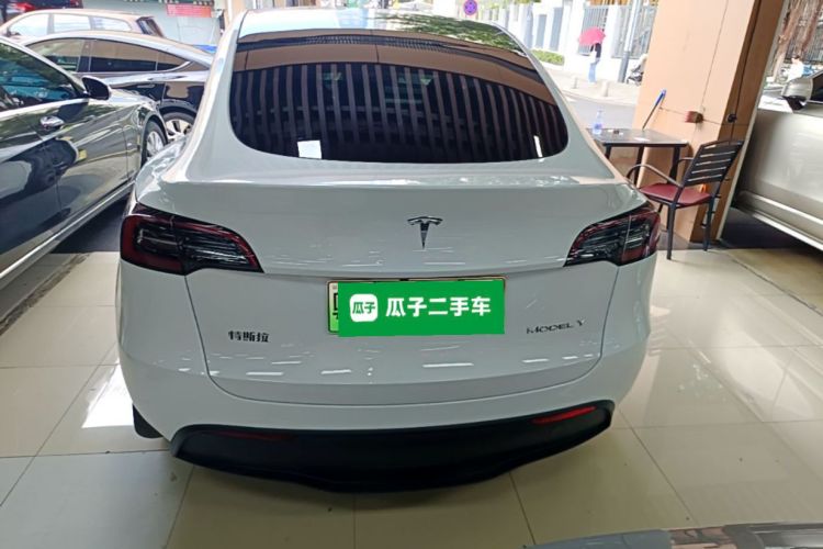 Tesla Model Y 2025 #6 Tesla Model Y 2025 car image #6