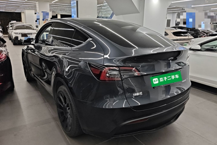 Tesla Model Y 2024 #5 Tesla Model Y 2024 car image #5