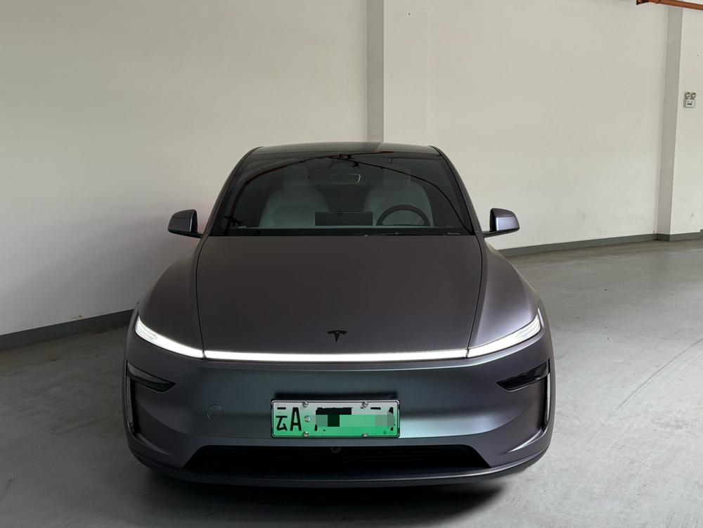 Tesla Model Y 2026 #2 Tesla Model Y 2026 car image #2