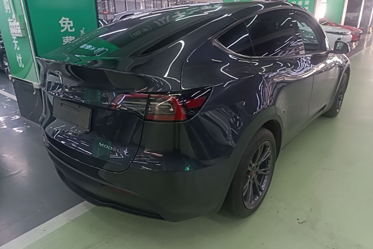 Tesla Model Y 2024 #7 Tesla Model Y 2024 car image #7