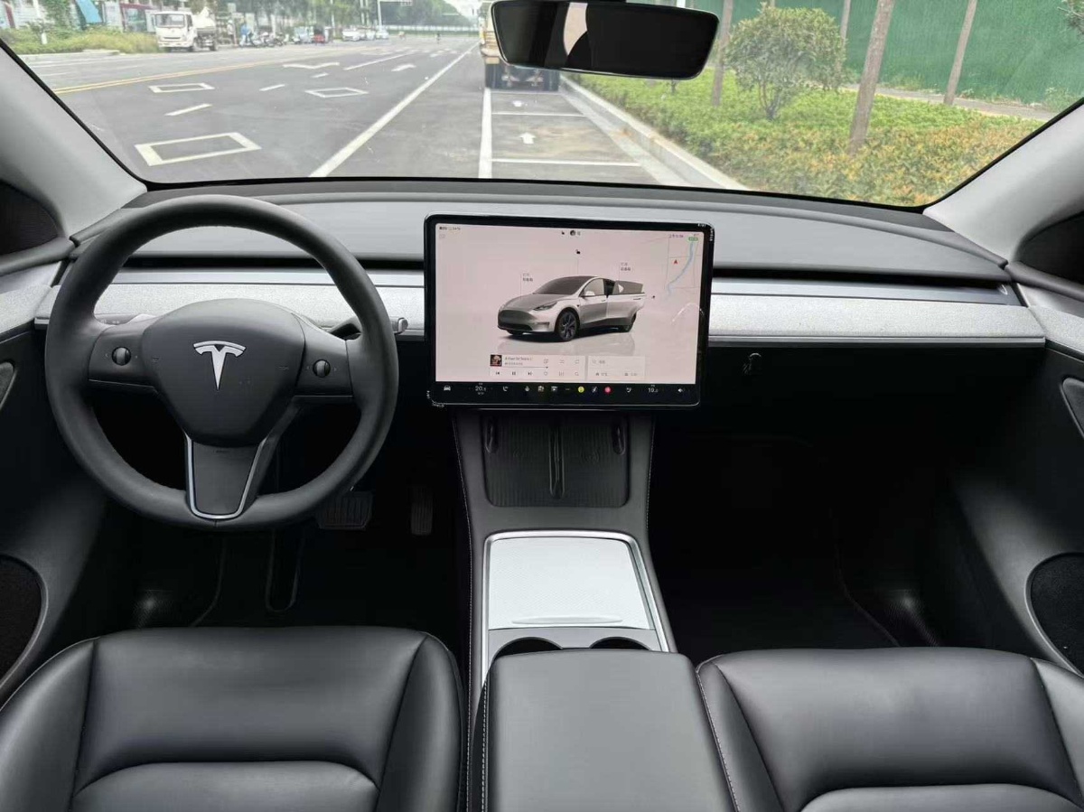 Tesla Model Y 2024 #4 Tesla Model Y 2024 car image #4