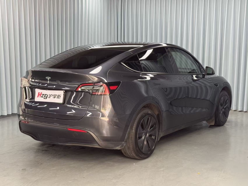 Tesla Model Y 2024 #7 Tesla Model Y 2024 car image #7