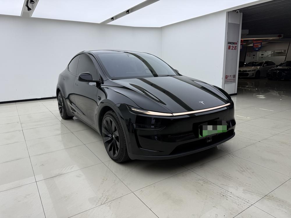 Tesla Model Y 2025 #3 Tesla Model Y 2025 car image #3