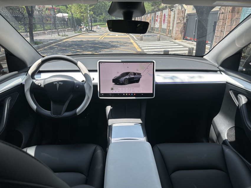 Tesla Model Y 2024 #6 Tesla Model Y 2024 car image #6