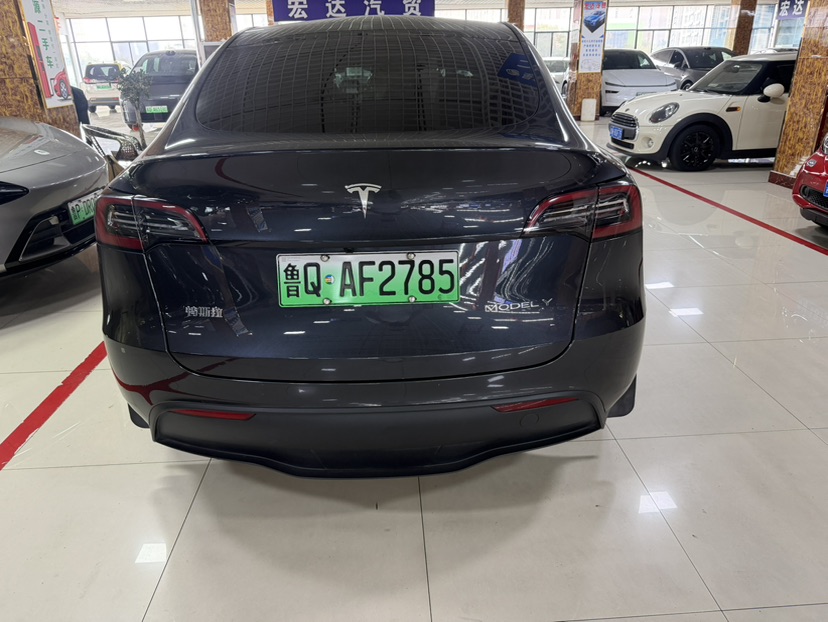 Tesla Model Y 2024 #7 Tesla Model Y 2024 car image #7