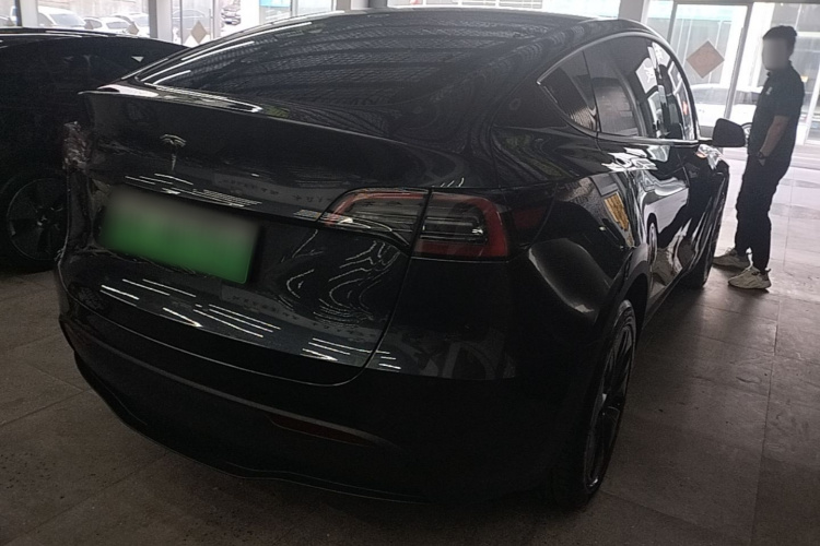 Tesla Model Y 2024 #5 Tesla Model Y 2024 car image #5