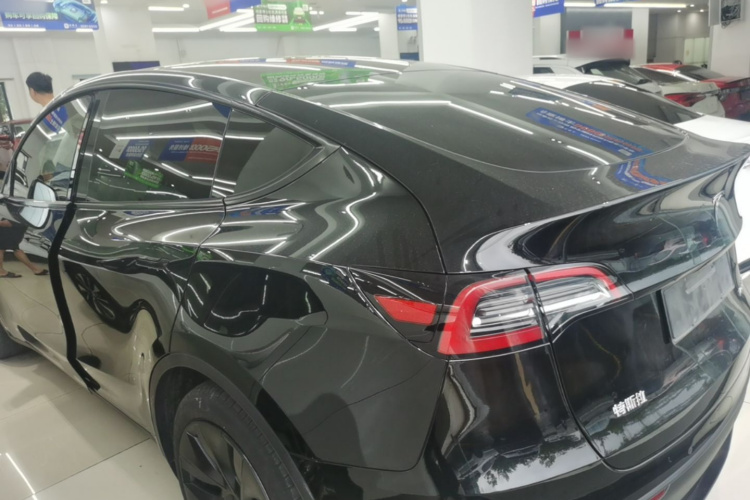Tesla Model Y 2024 #5 Tesla Model Y 2024 car image #5