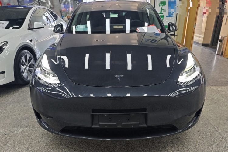 Tesla Model Y 2024 #3 Tesla Model Y 2024 car image #3