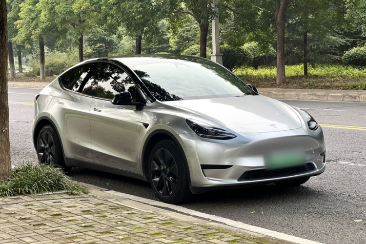 Tesla Model Y 2024 #6 Tesla Model Y 2024 car image #6