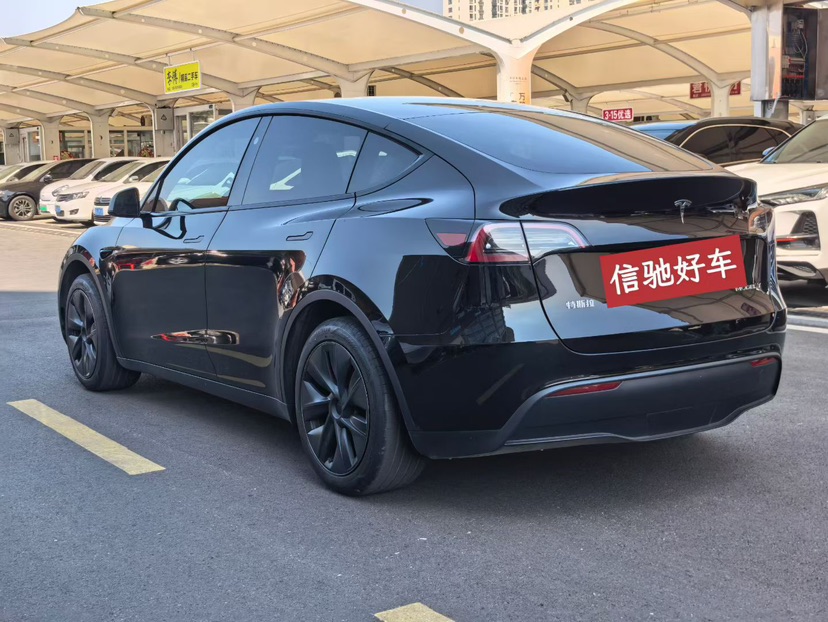 Tesla Model Y 2024 #6 Tesla Model Y 2024 car image #6
