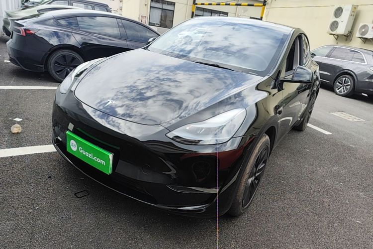 Tesla Model Y 2024 #2 Tesla Model Y 2024 car image #2