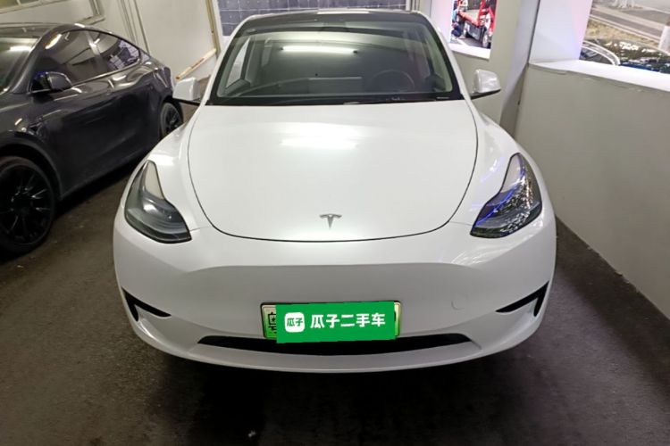 Tesla Model Y 2024 #3 Tesla Model Y 2024 car image #3