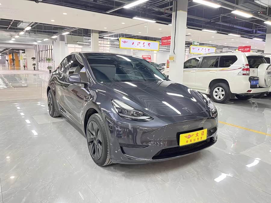 Tesla Model Y 2024 #5 Tesla Model Y 2024 car image #5