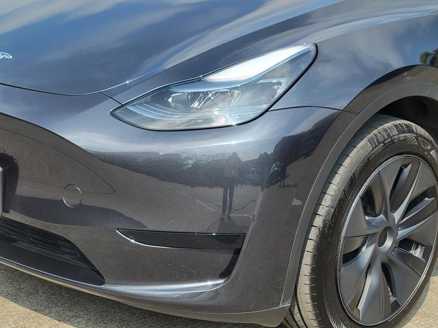 Tesla Model Y 2024 #5 Tesla Model Y 2024 car image #5