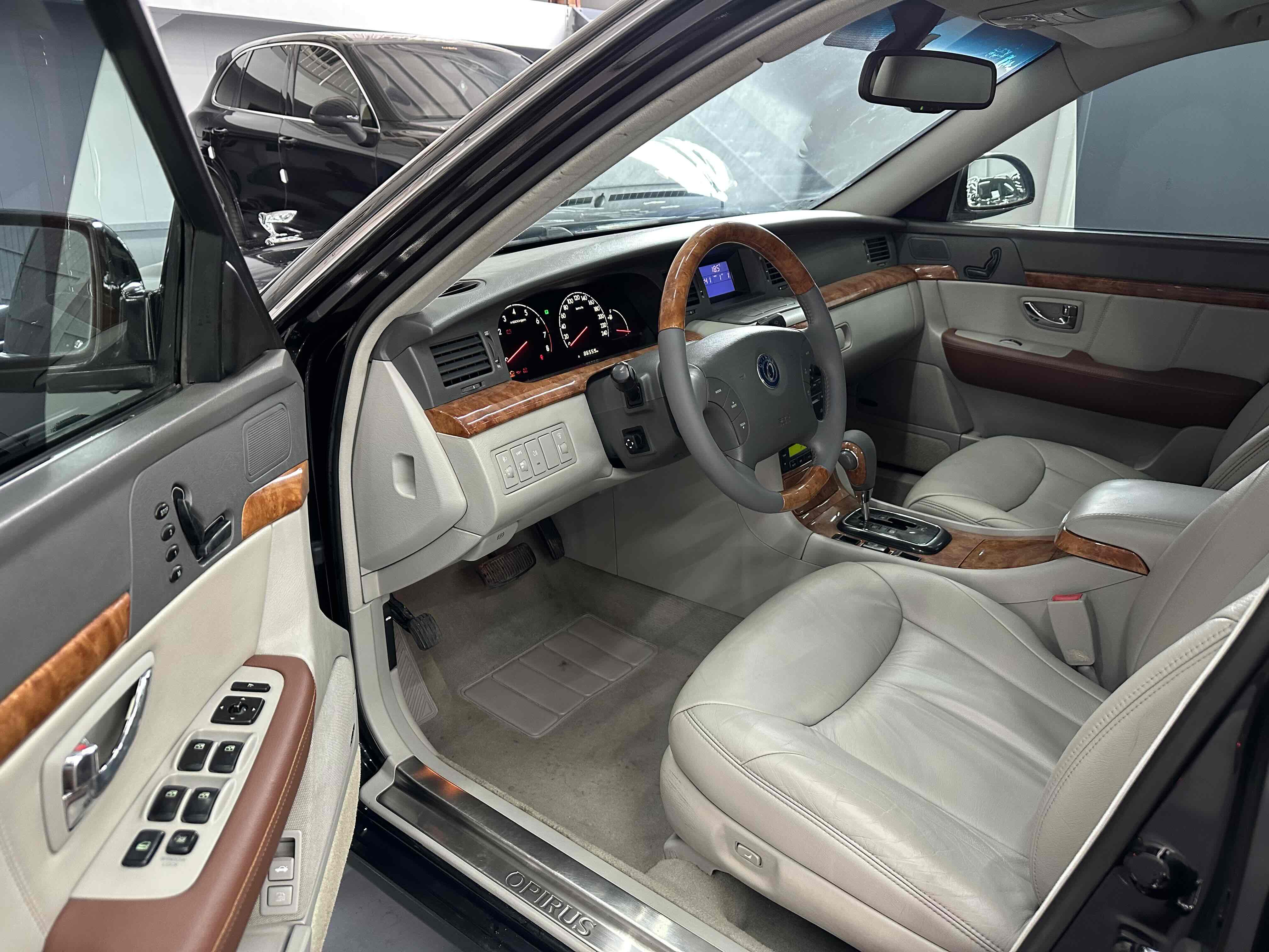 Kia Opirus 2011 صورة سيارة #5