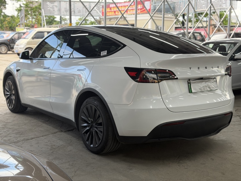 Tesla Model Y 2024 #7 Tesla Model Y 2024 car image #7