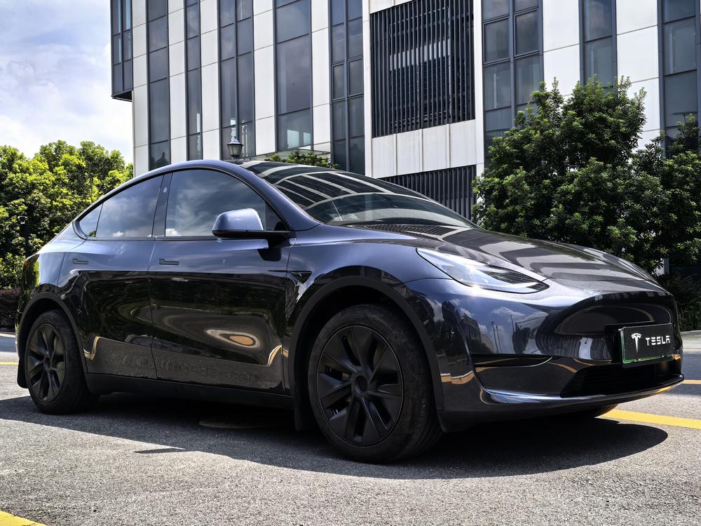 Tesla Model Y 2024 #3 Tesla Model Y 2024 car image #3