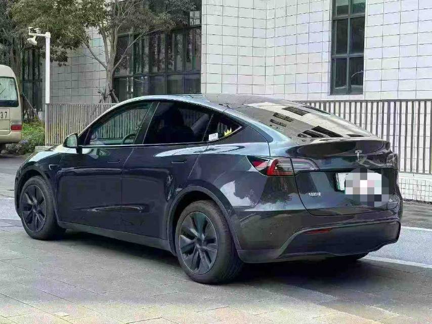 Tesla Model Y 2024 #7 Tesla Model Y 2024 car image #7