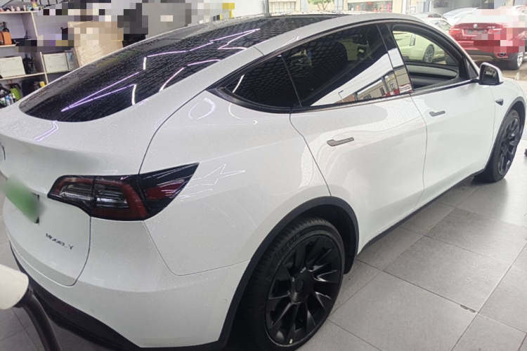 Tesla Model Y 2024 #7 Tesla Model Y 2024 car image #7