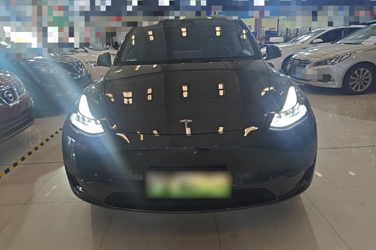 Tesla Model Y 2024 #3 Tesla Model Y 2024 car image #3